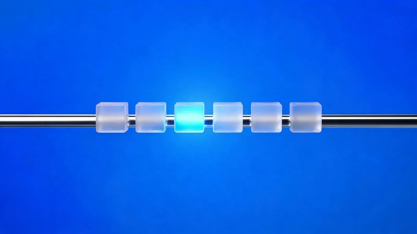 Six frosted-glass cubes on a chrome rail, one lit blue, on a blue background.