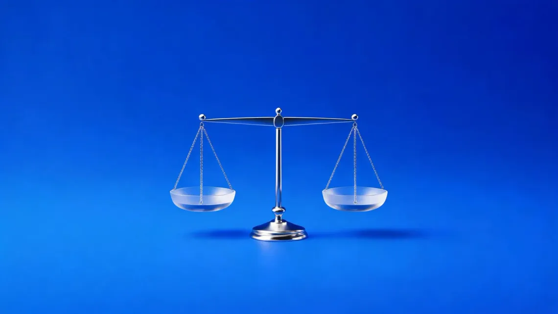 A chrome balance scale with two glass pans held level, on a blue background.