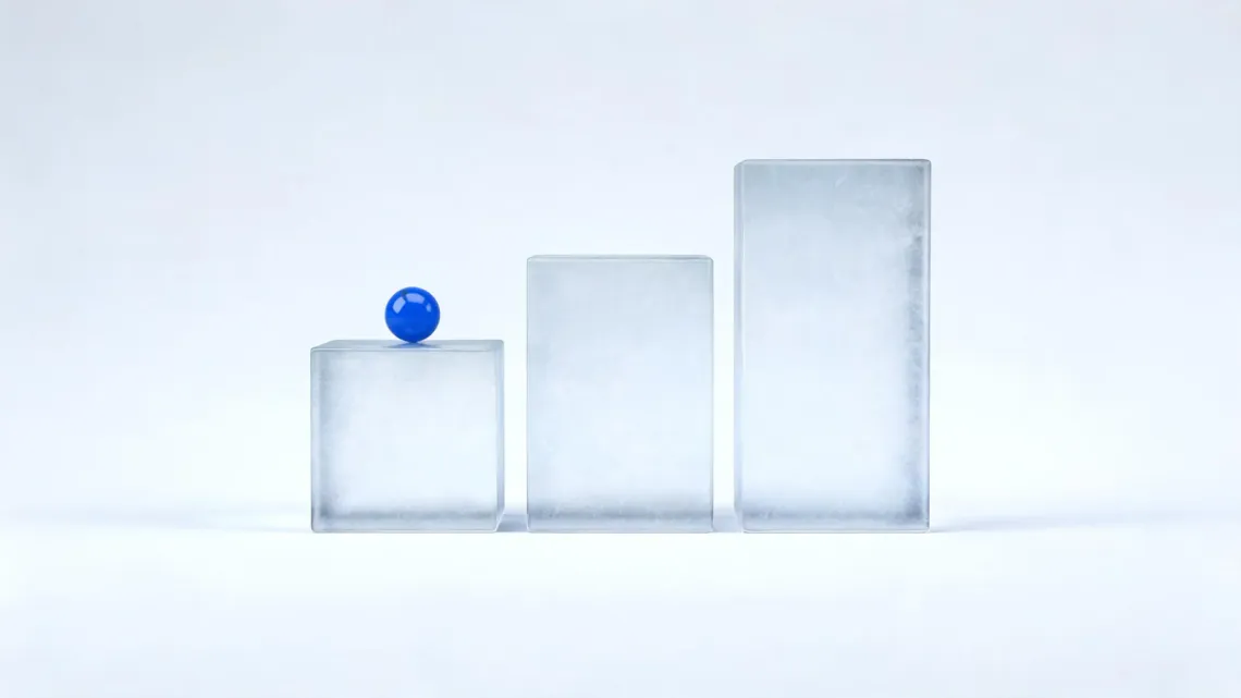 Three frosted-glass blocks rising in height like steps, with a small blue sphere on the lowest one, on a light grey background.