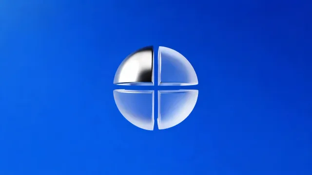 A sphere split into four quarters, one chrome and three glass, on a blue background.