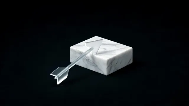 A glass arrow stopped against a white marble block, on a black background.