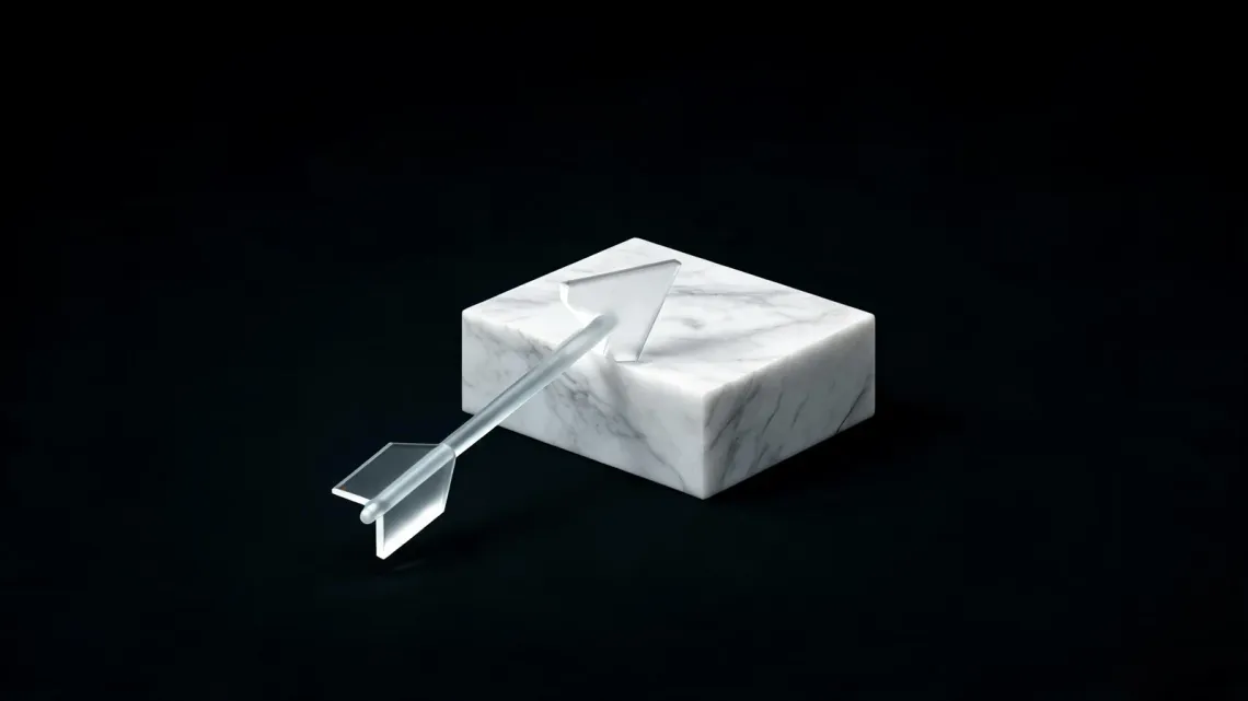 A glass arrow stopped against a white marble block, on a black background.